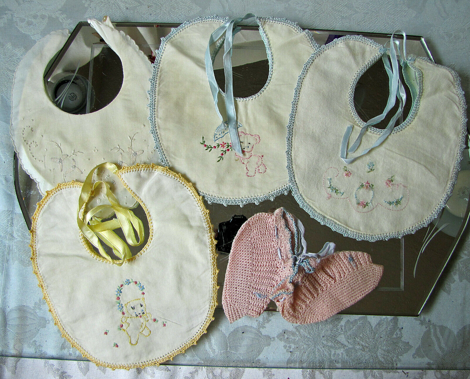 Collection of 4 Vintage Baby Bibs and One Pair Booties Please see photos